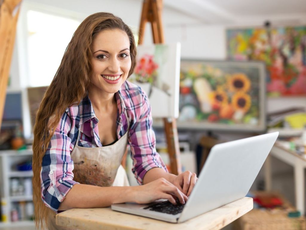 woman with an open laptop